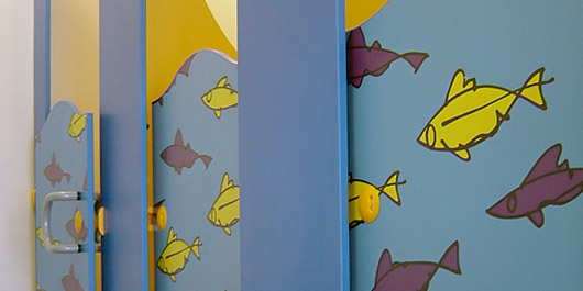 Fish motif on toilet door panels
