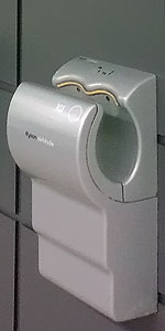 A wall mounted Dyson Airblade hand drier